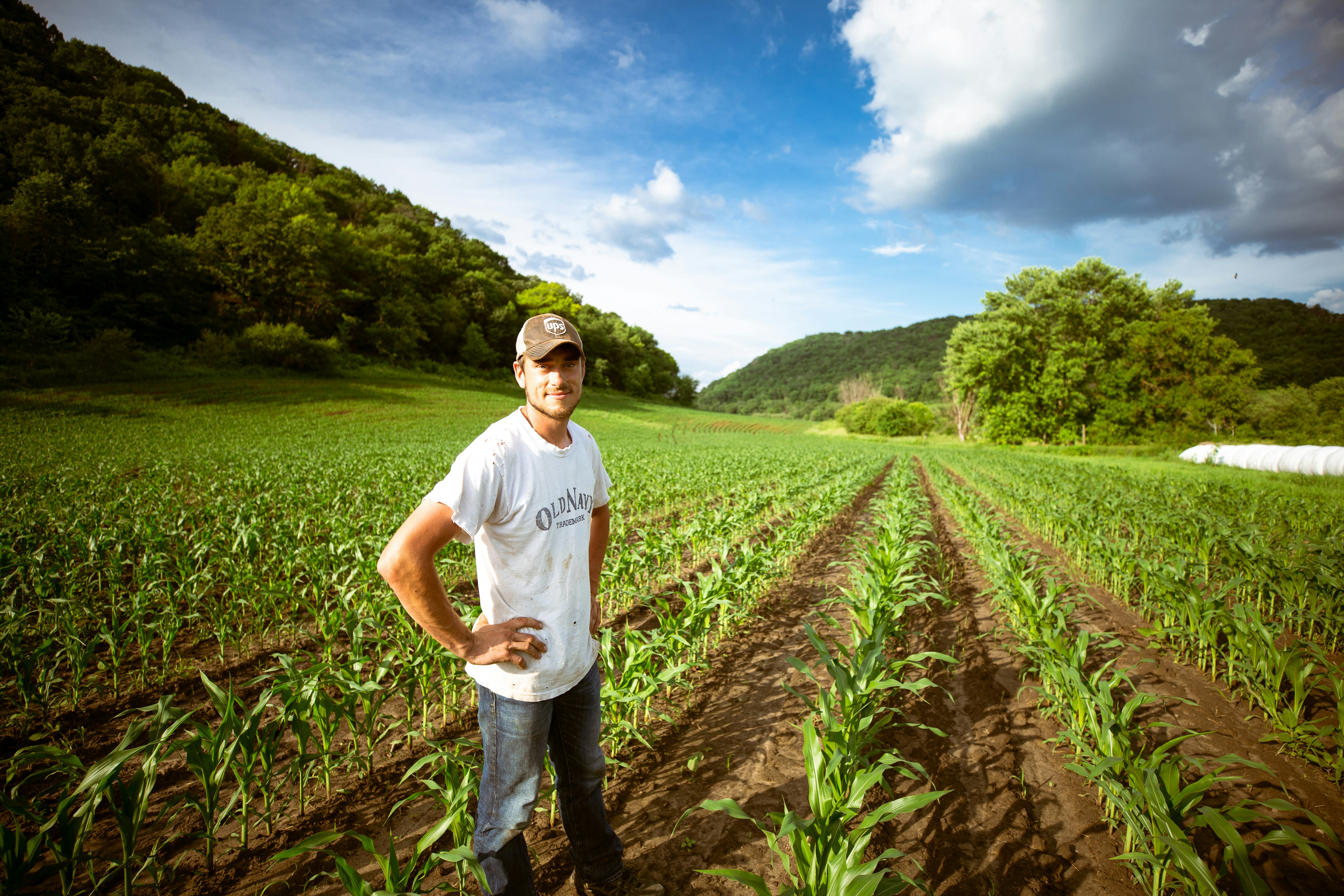 A farmer taking pride in his crops